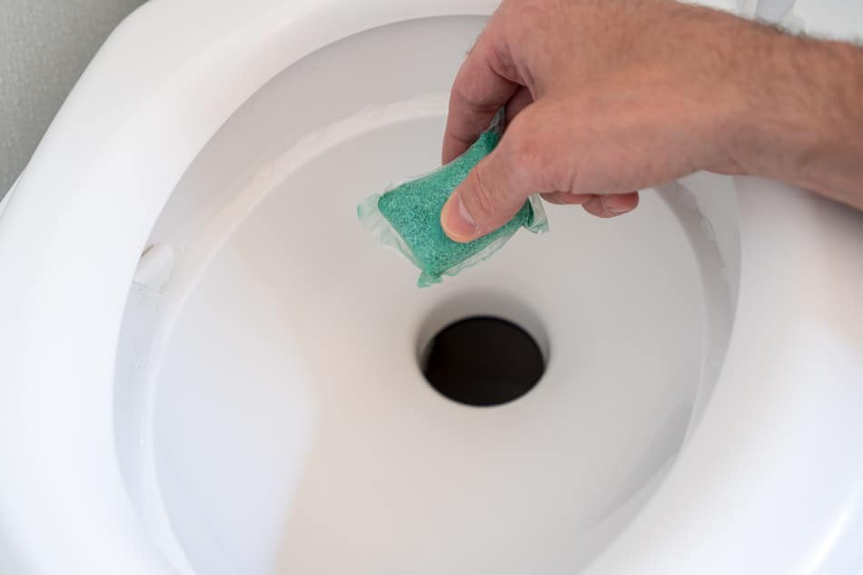 Dropping chemicals into cassette toilet