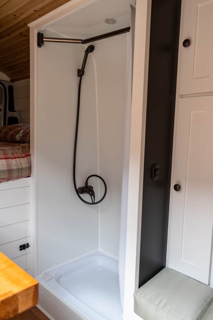 Shower and toilet inside a camper van