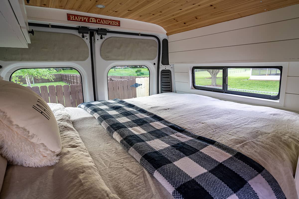Bed in van with window